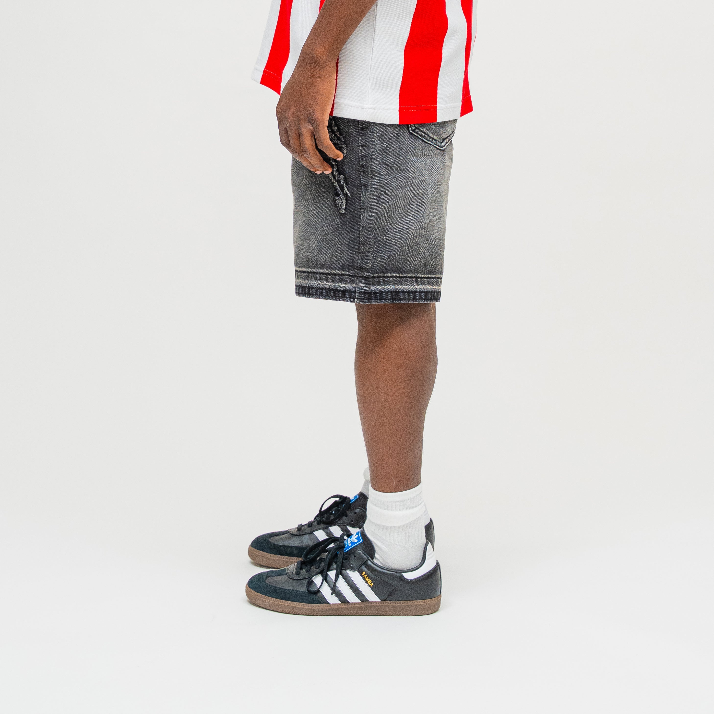 CAMPUS GOODS LA Applique Denim Short in Black, detail view, side seam and hem
