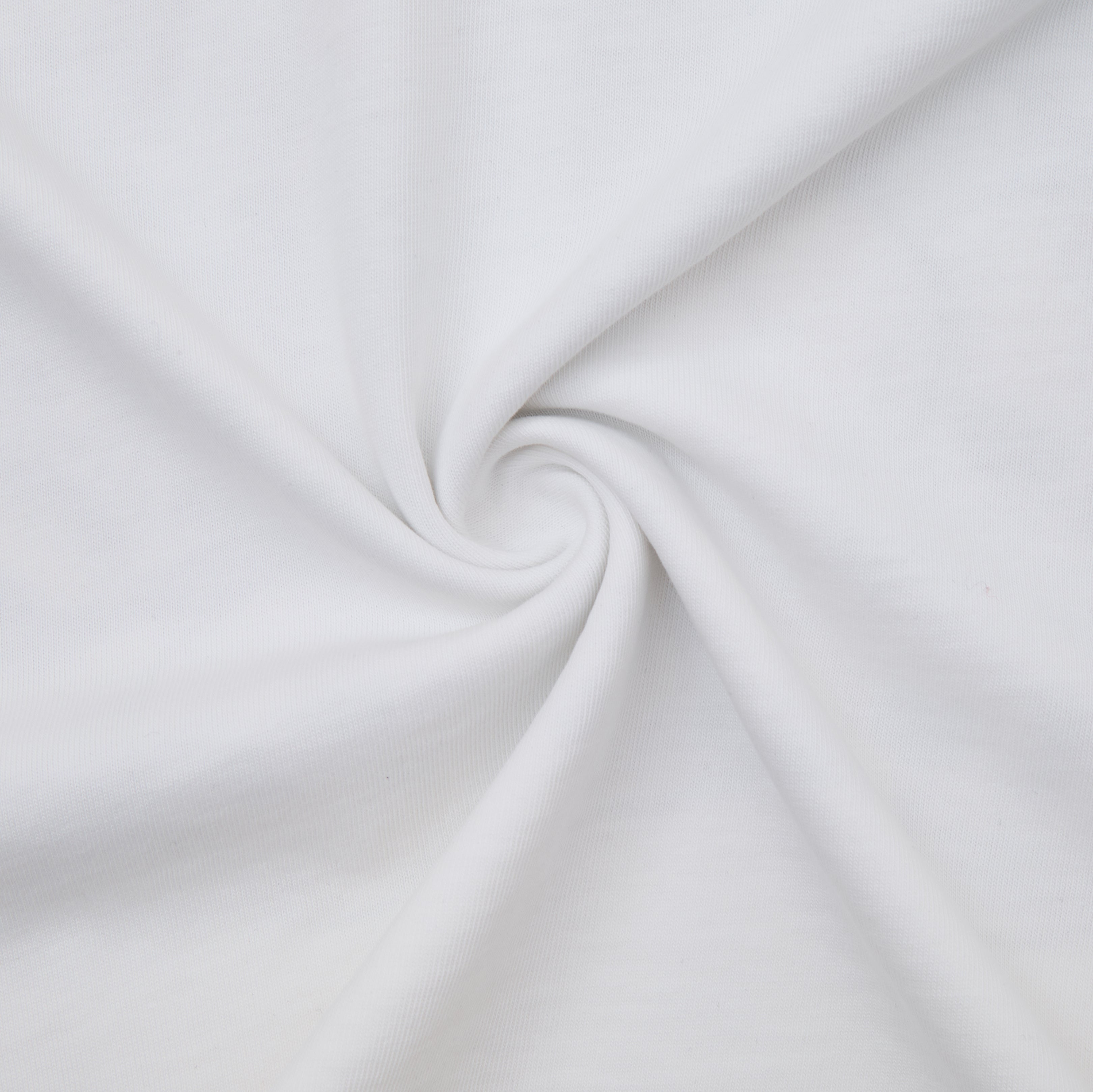 Close-up of white fabric with a subtle swirl pattern