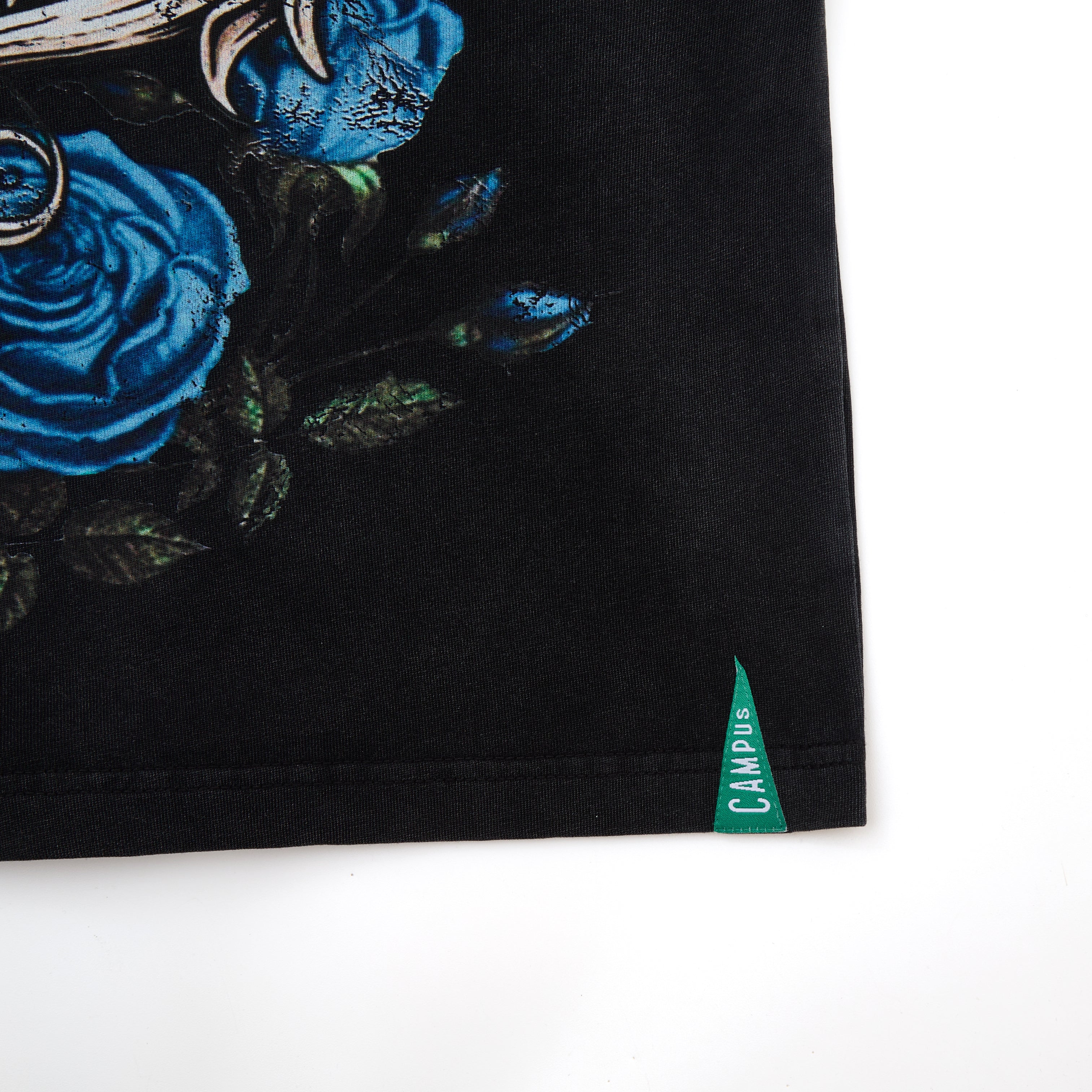 Black garment with blue floral design and 'CAMPUS' label on a white background