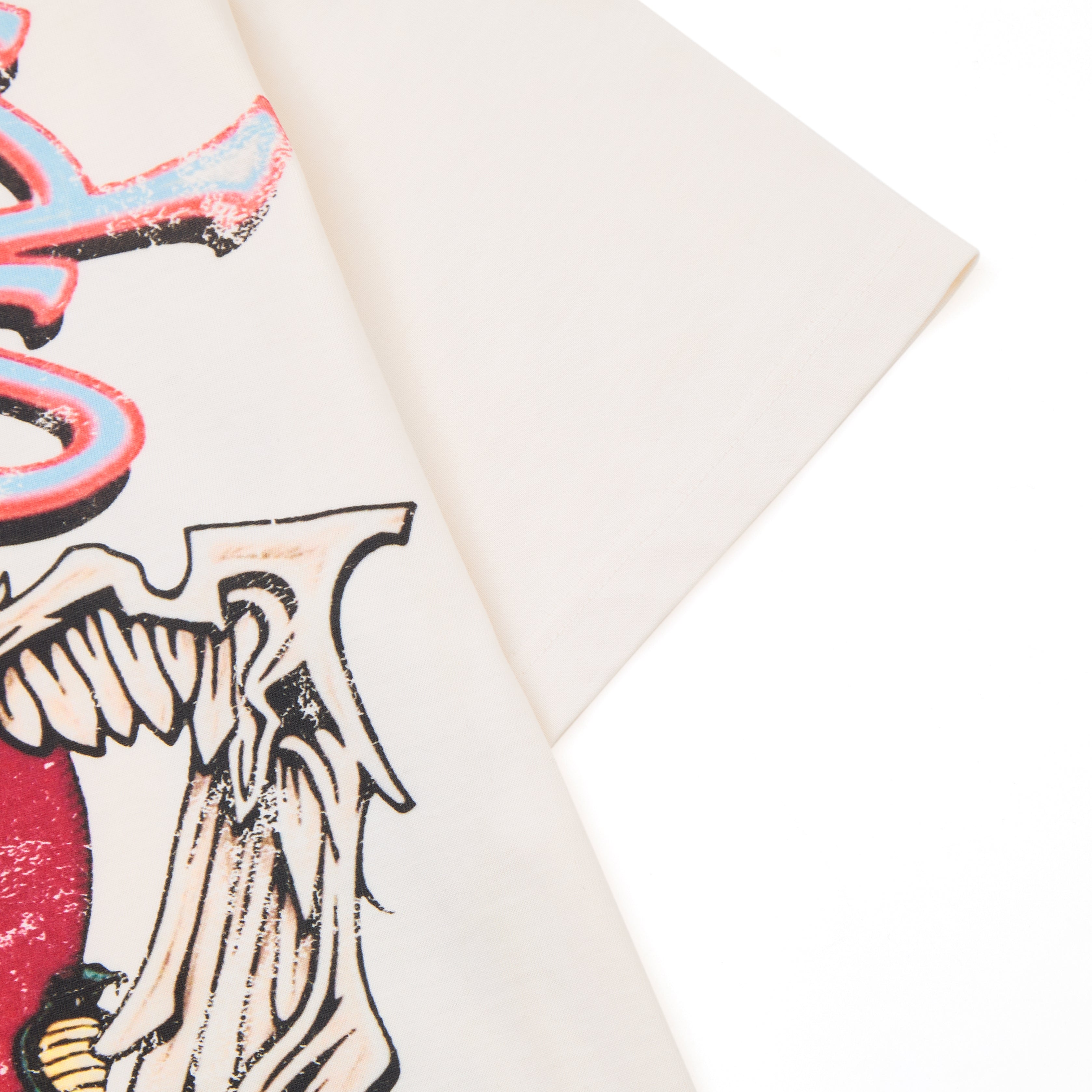 Close-up of a printed design with red, black, and white colors on a white background.