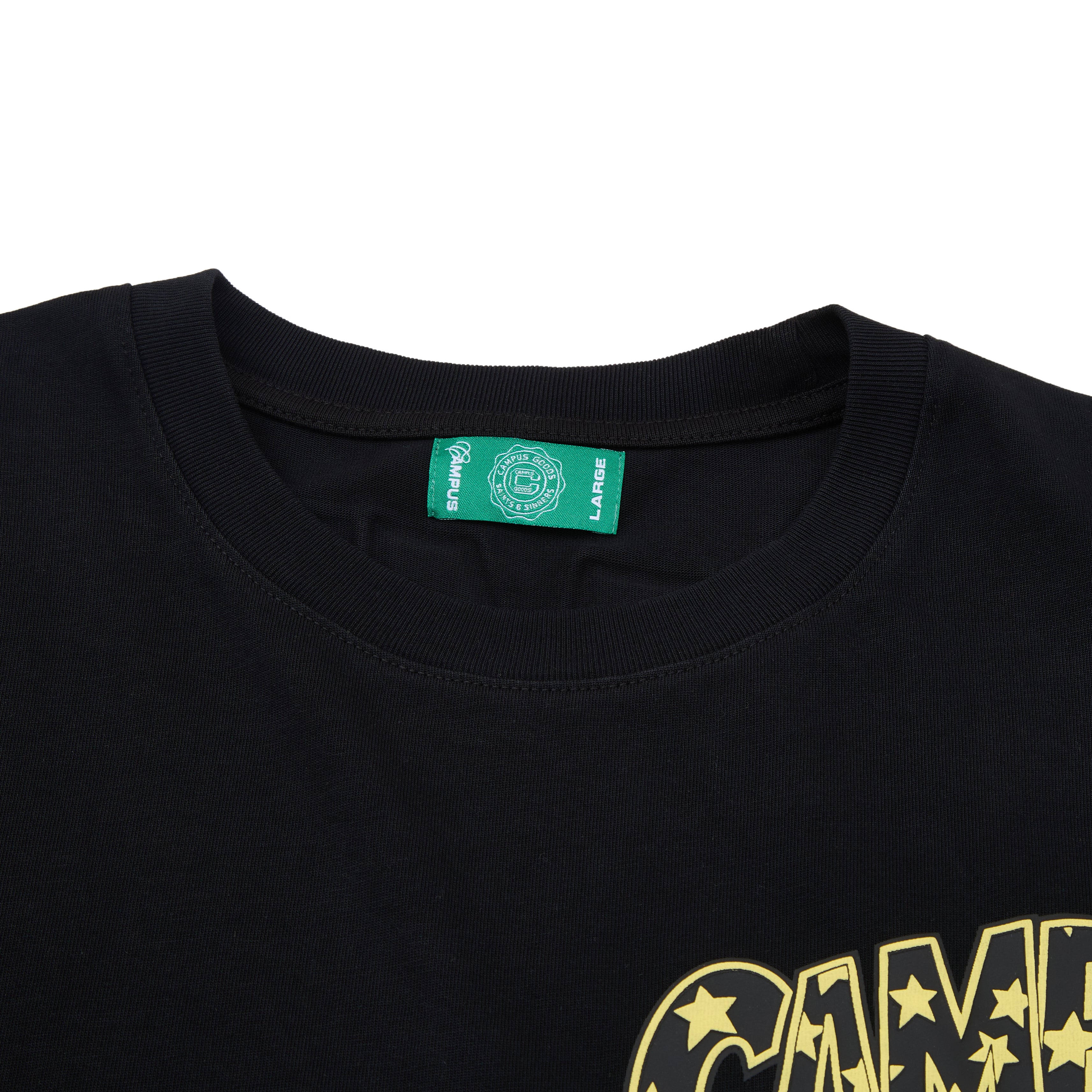 Black t-shirt with yellow graphic design and a green label on a white background