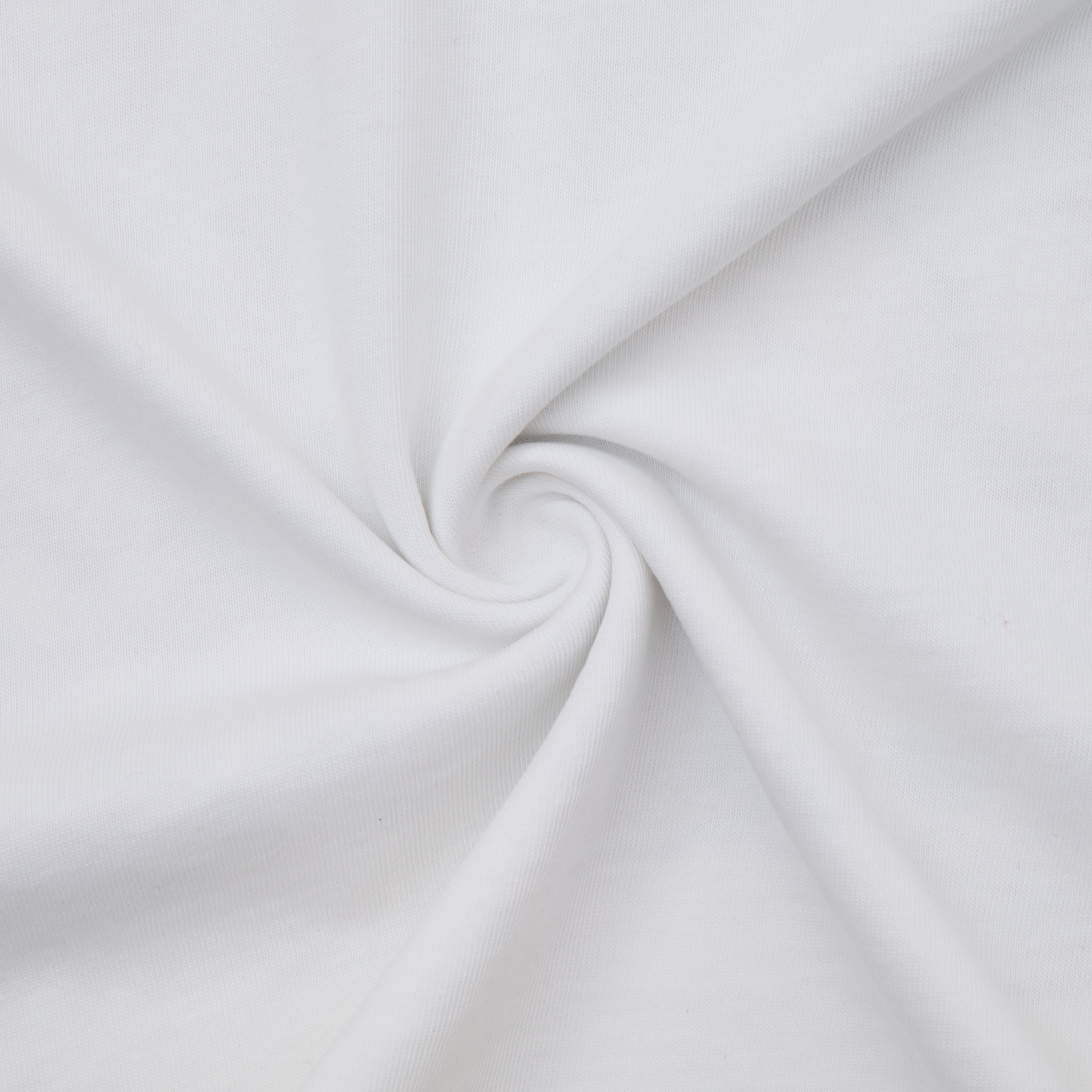 Close-up of white fabric with a subtle swirl pattern