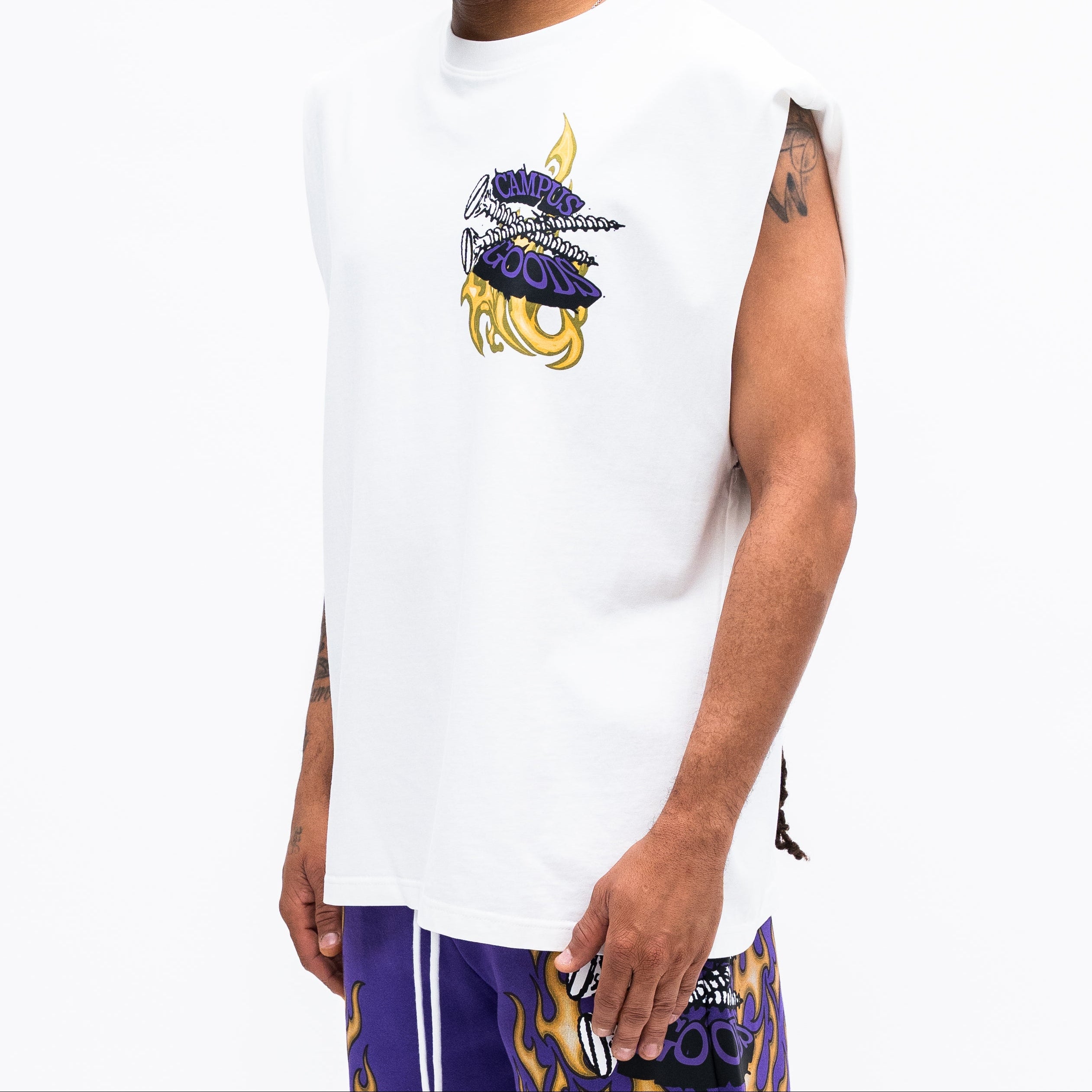 Person wearing a white sleeveless shirt with a colorful logo on a white background
