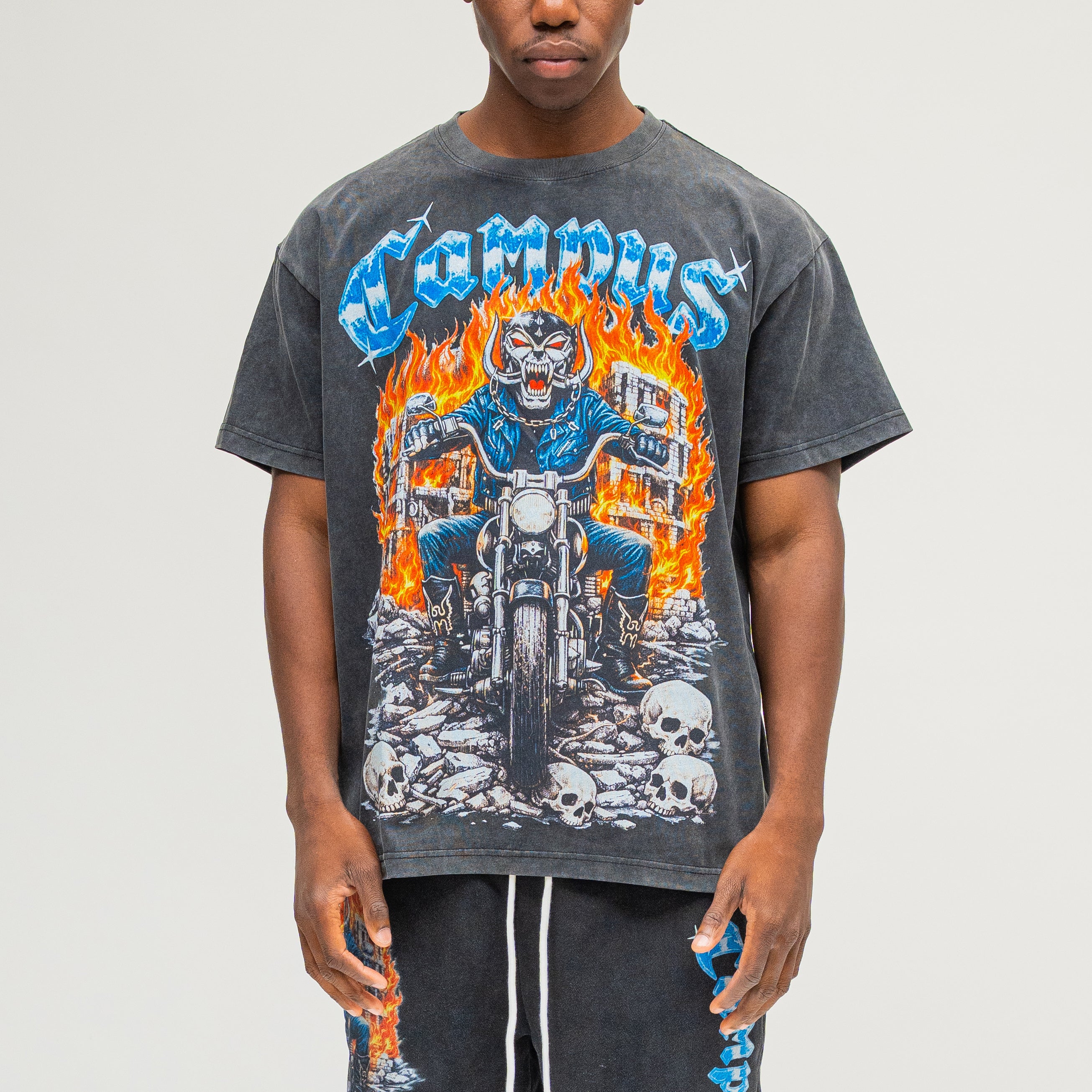 Campus Goods Chopper Tee Black – front view on model, skull biker graphic with icy-blue Campus lettering