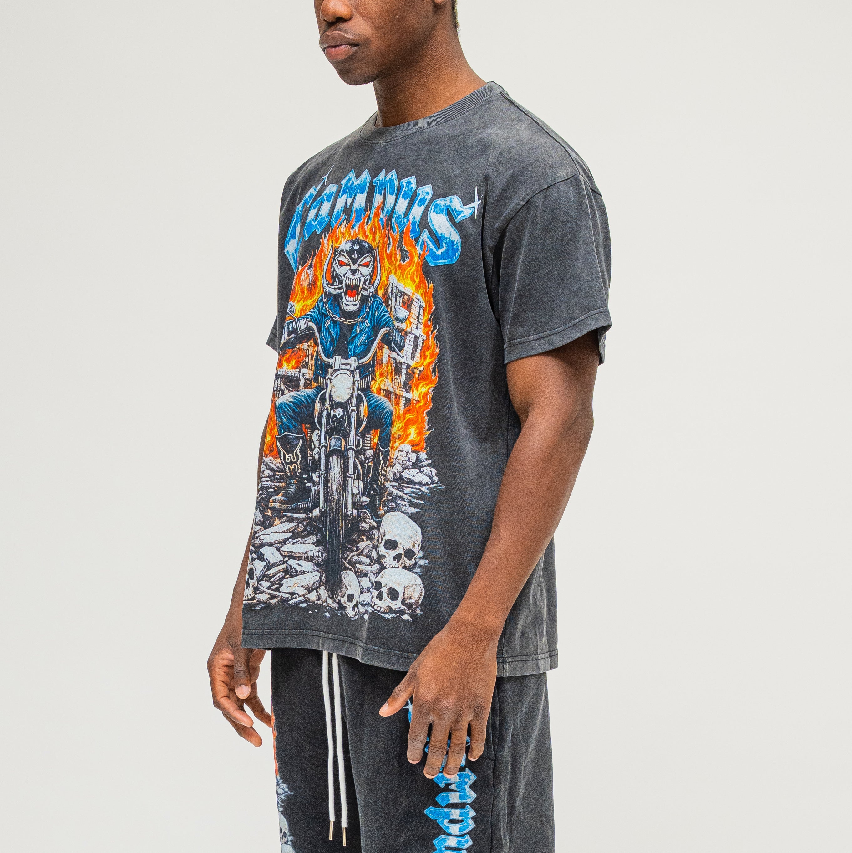 Campus Goods Chopper Tee Black – side angle on model showing skull biker graphic and oversized fit