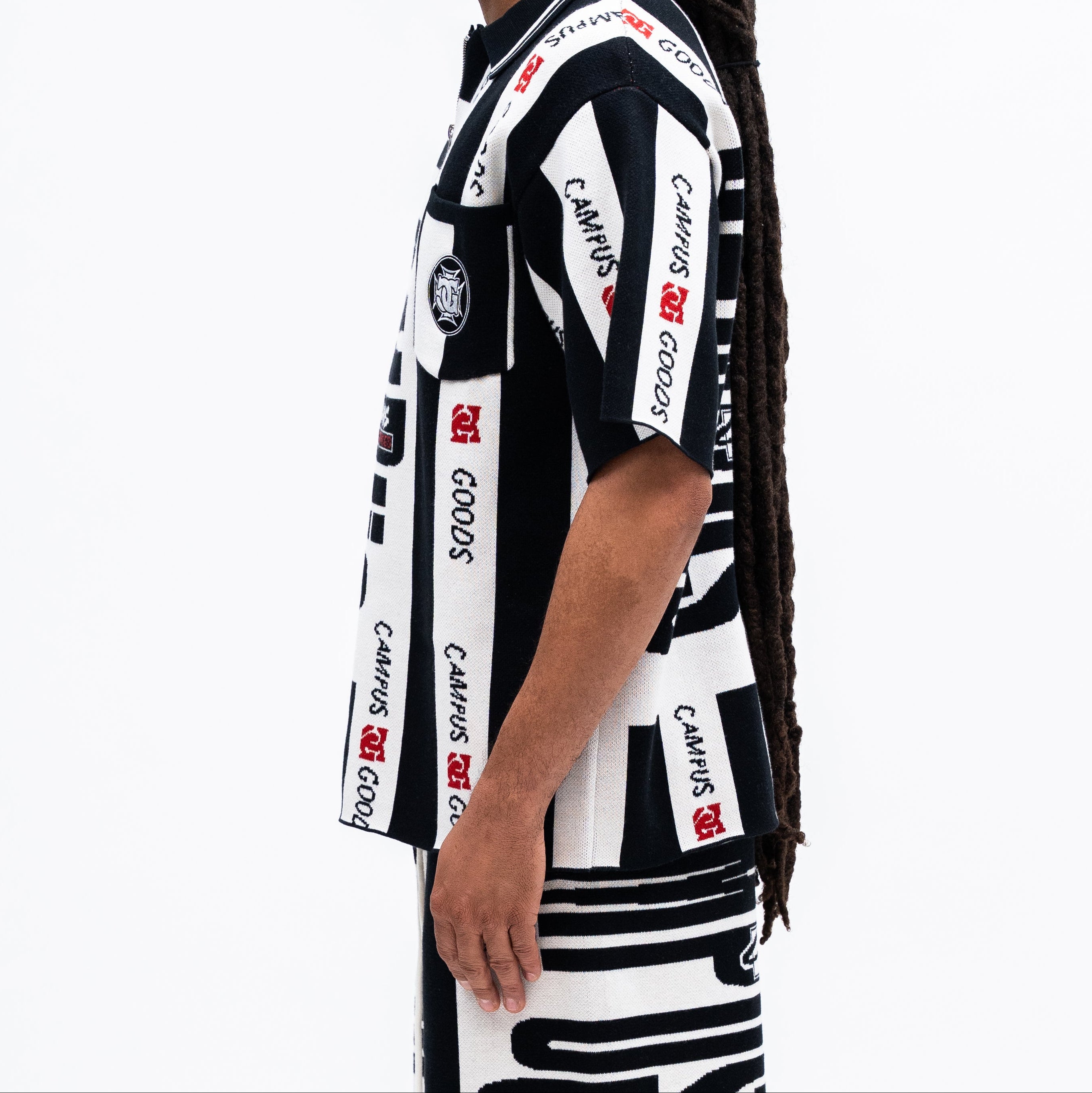 Person wearing a black and white striped shirt with CAMPUS GOODS brand logos on a white background