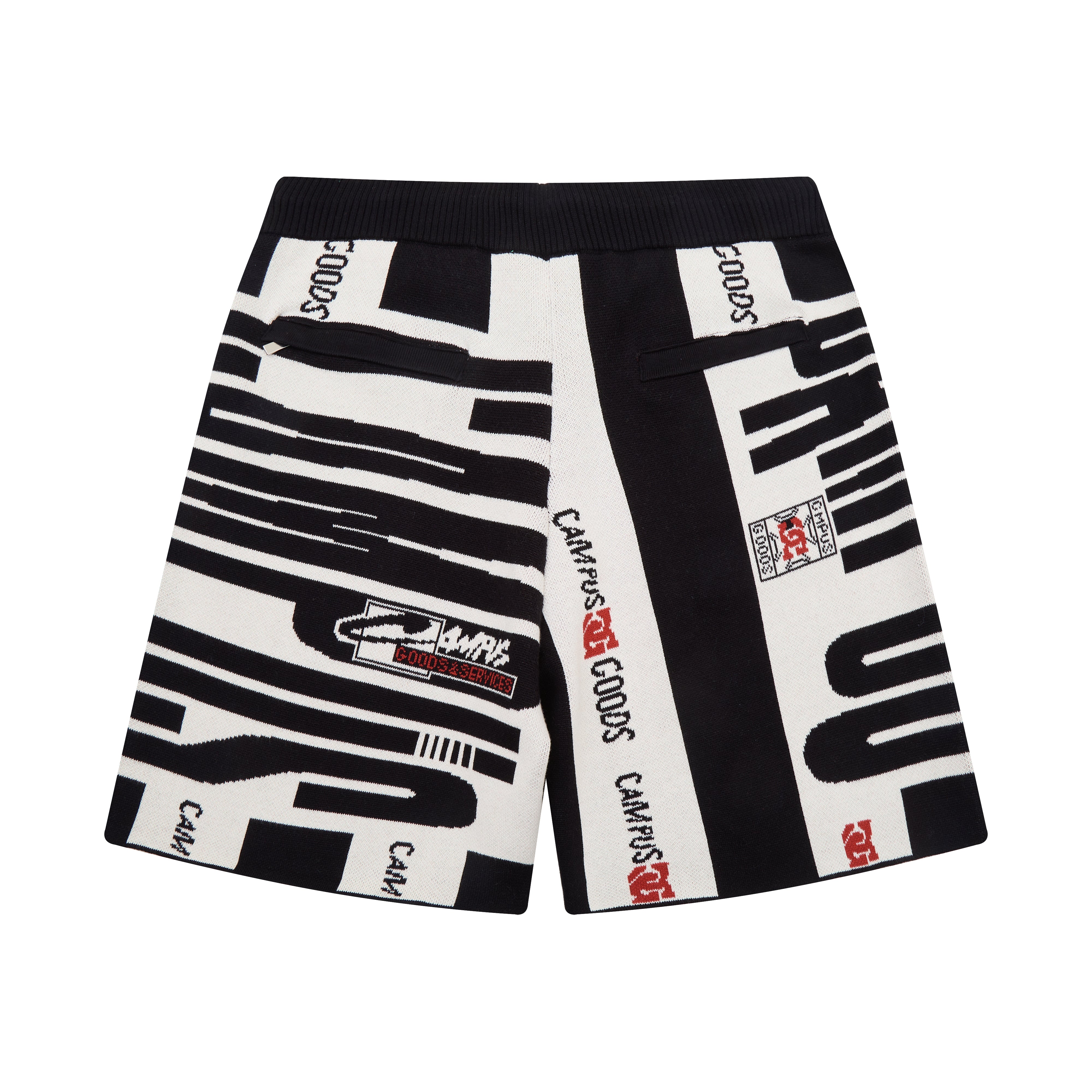 Black and white shorts with branding on a white background