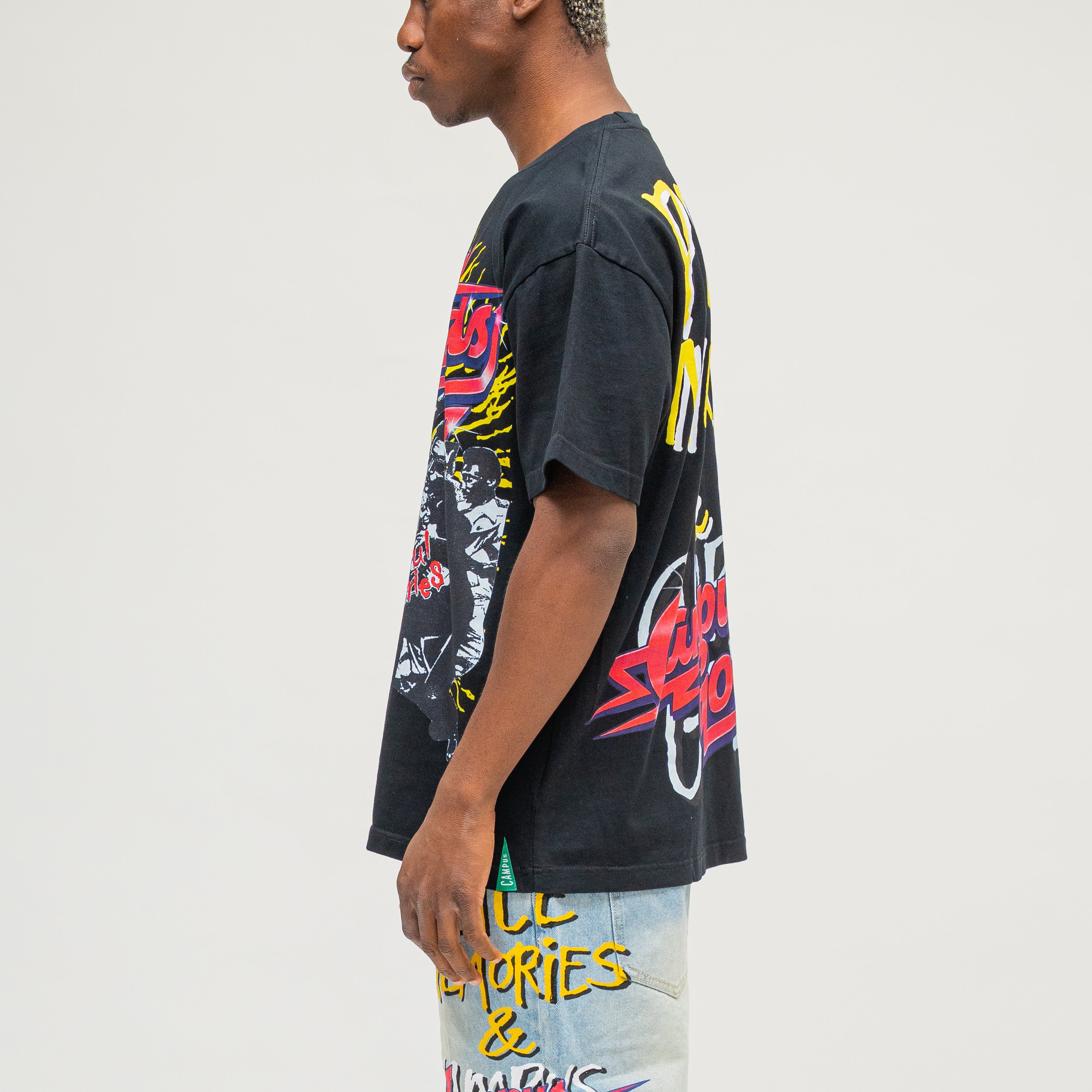CAMPUS GOODS LA Harlem Tee in Black, side view, front graphic detail