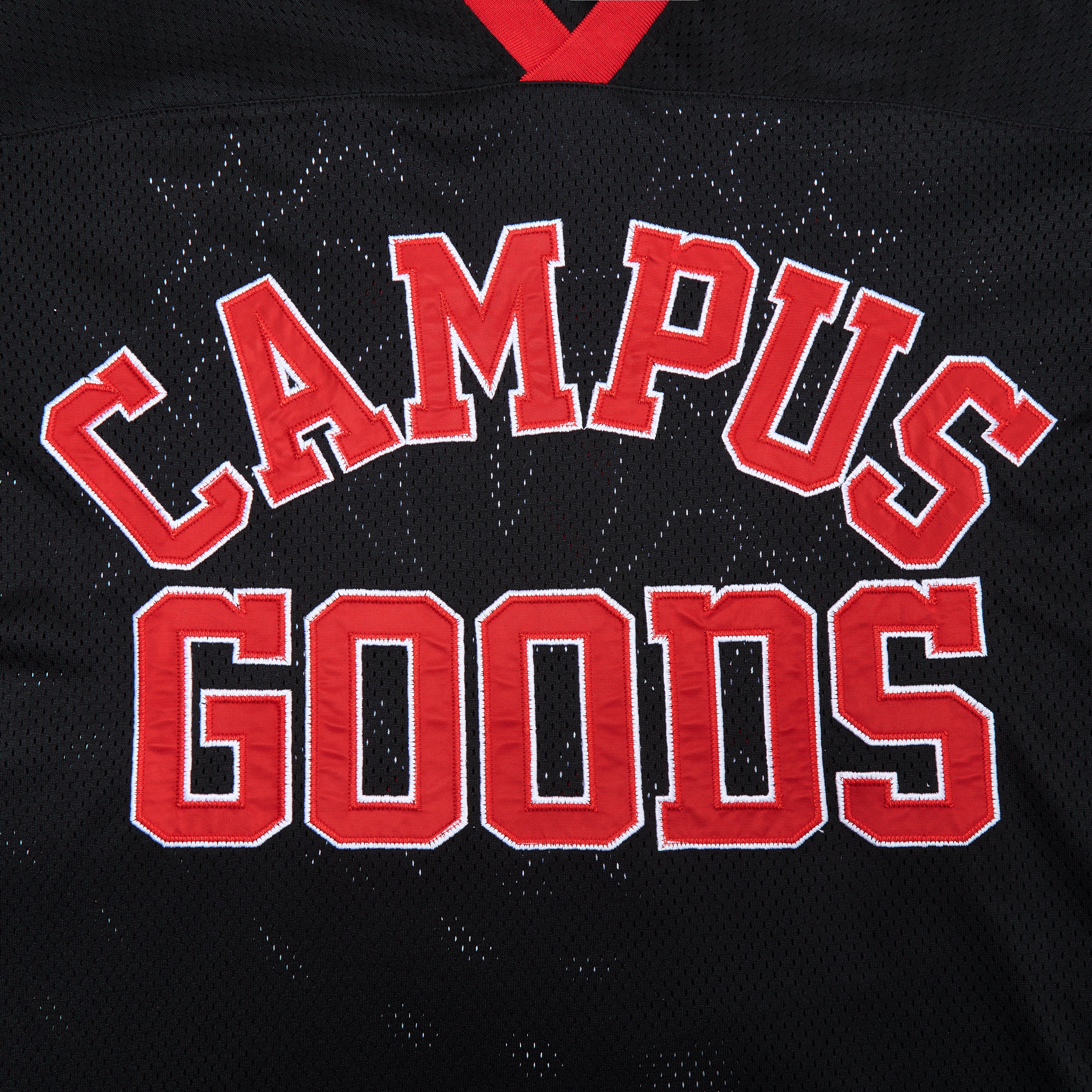 Black shirt with red 'CAMPUS GOODS' text on a black background