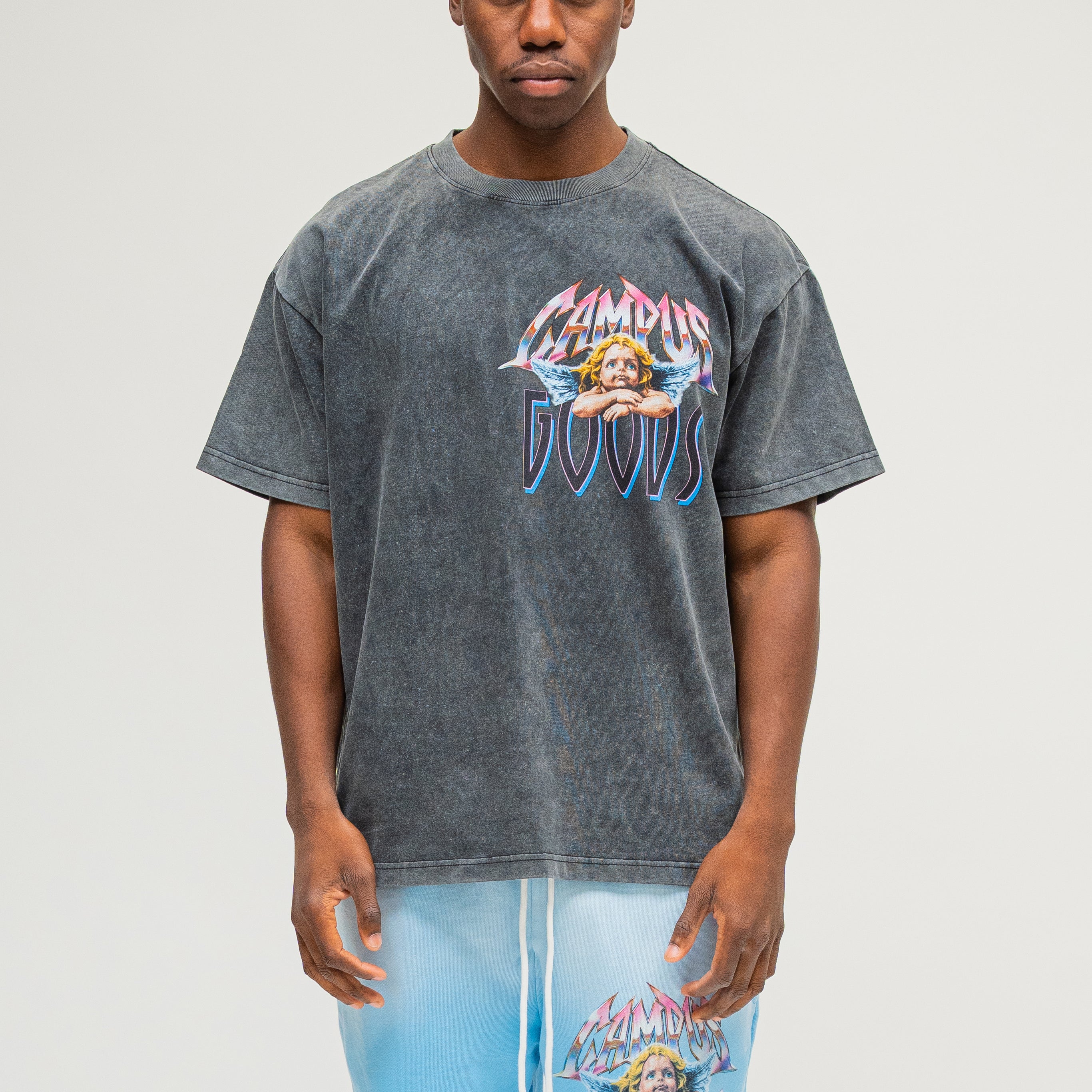 Campus Goods LA Metallic Tee in black, front view on male model, angel cherub graphic with Campus Goods logo
