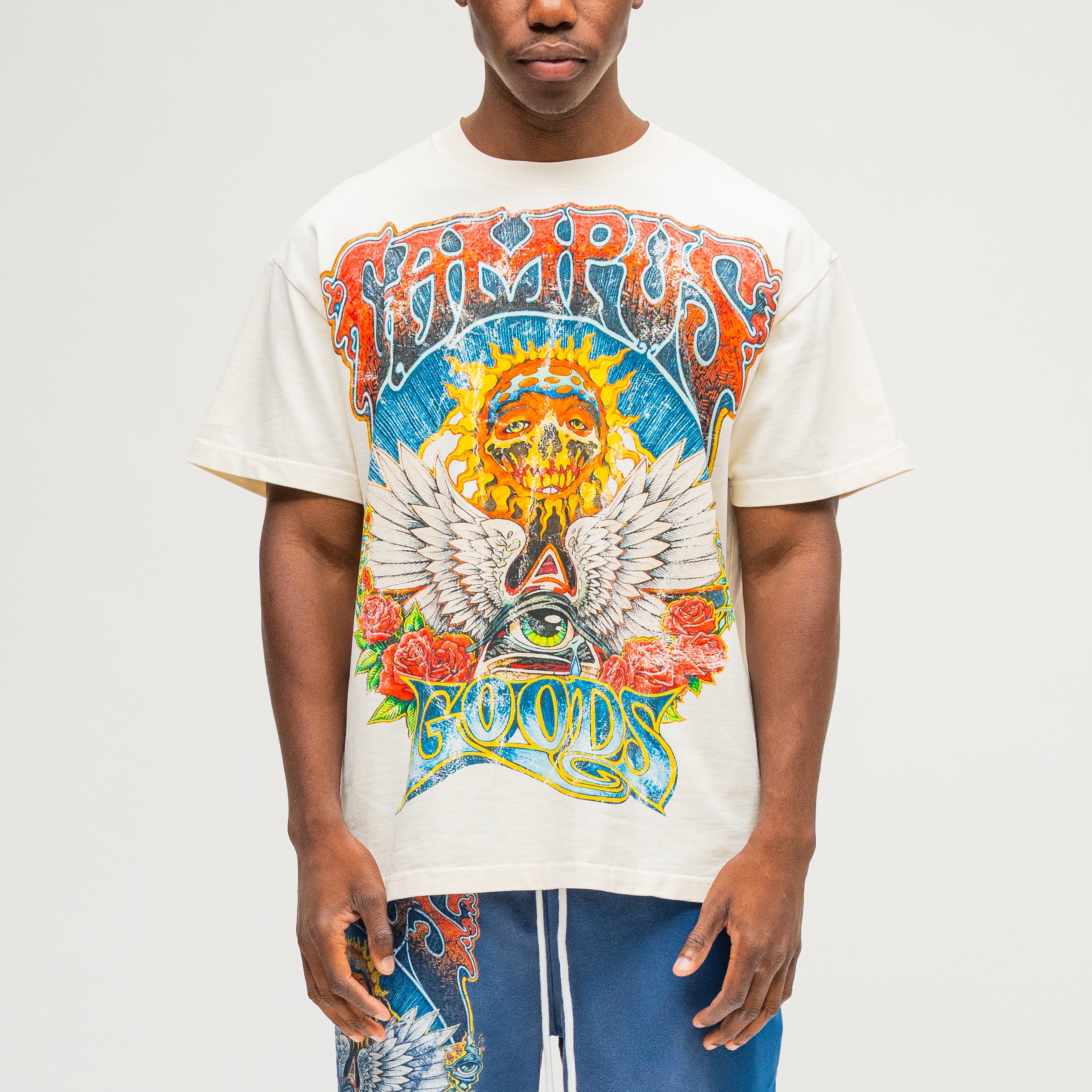 Campus Goods Psychedelic Tee in cream, front view with skull, wings, roses, and all-seeing eye graphic