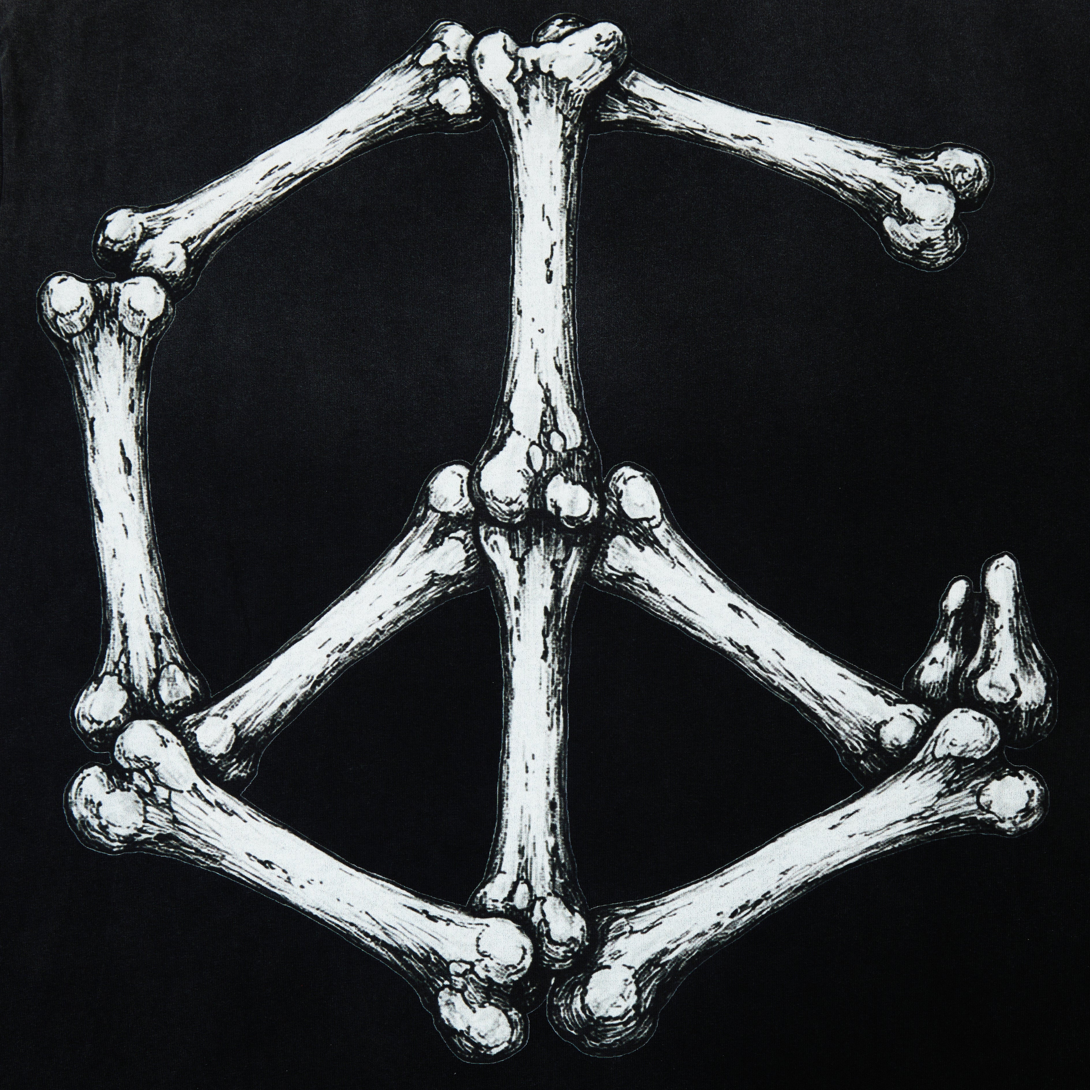 CAMPUS GOODS Psychedelic Tee in Black, detail view, bone peace sign graphic