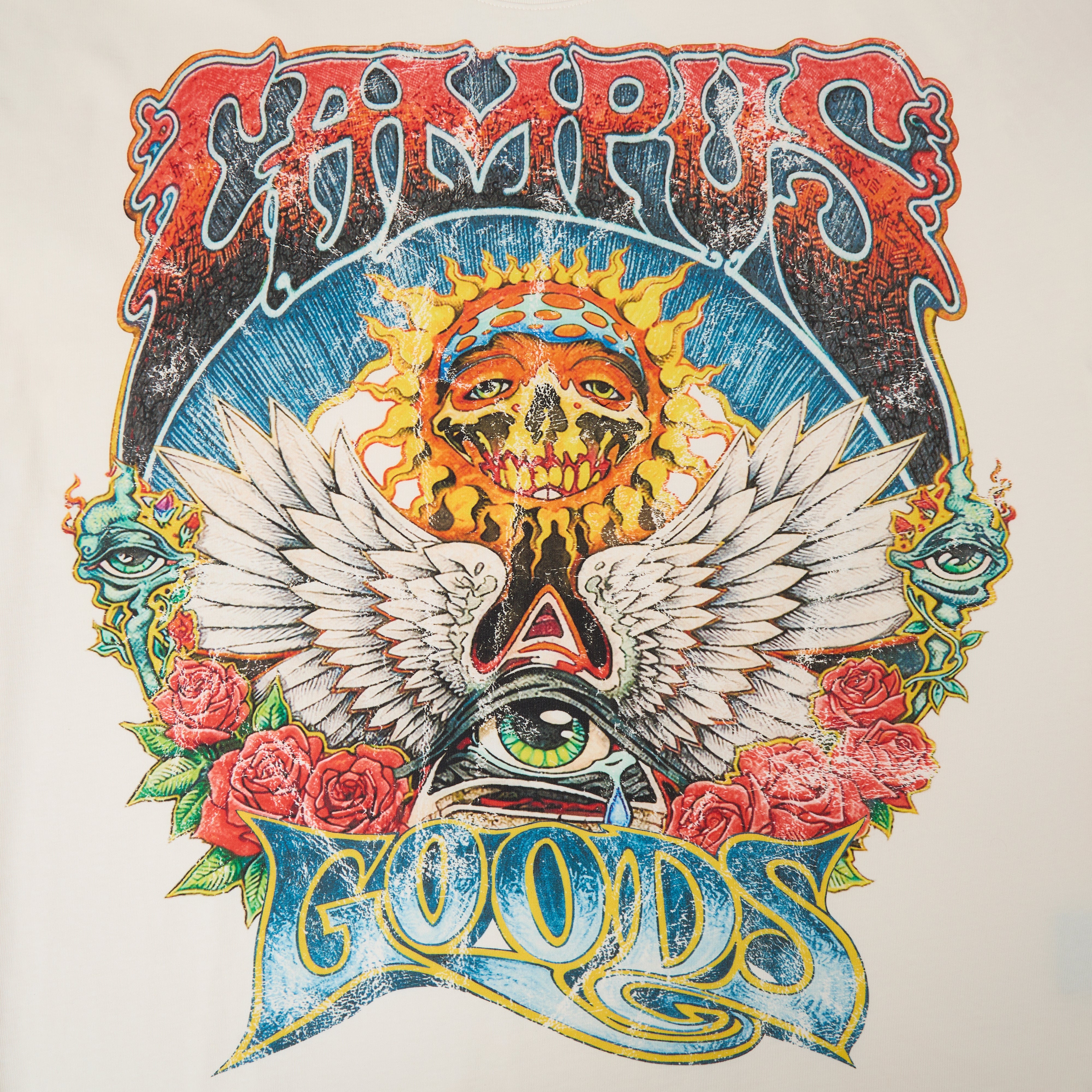 Close-up detail of Psychedelic Tee graphic on cream fabric showing colorful distressed art design