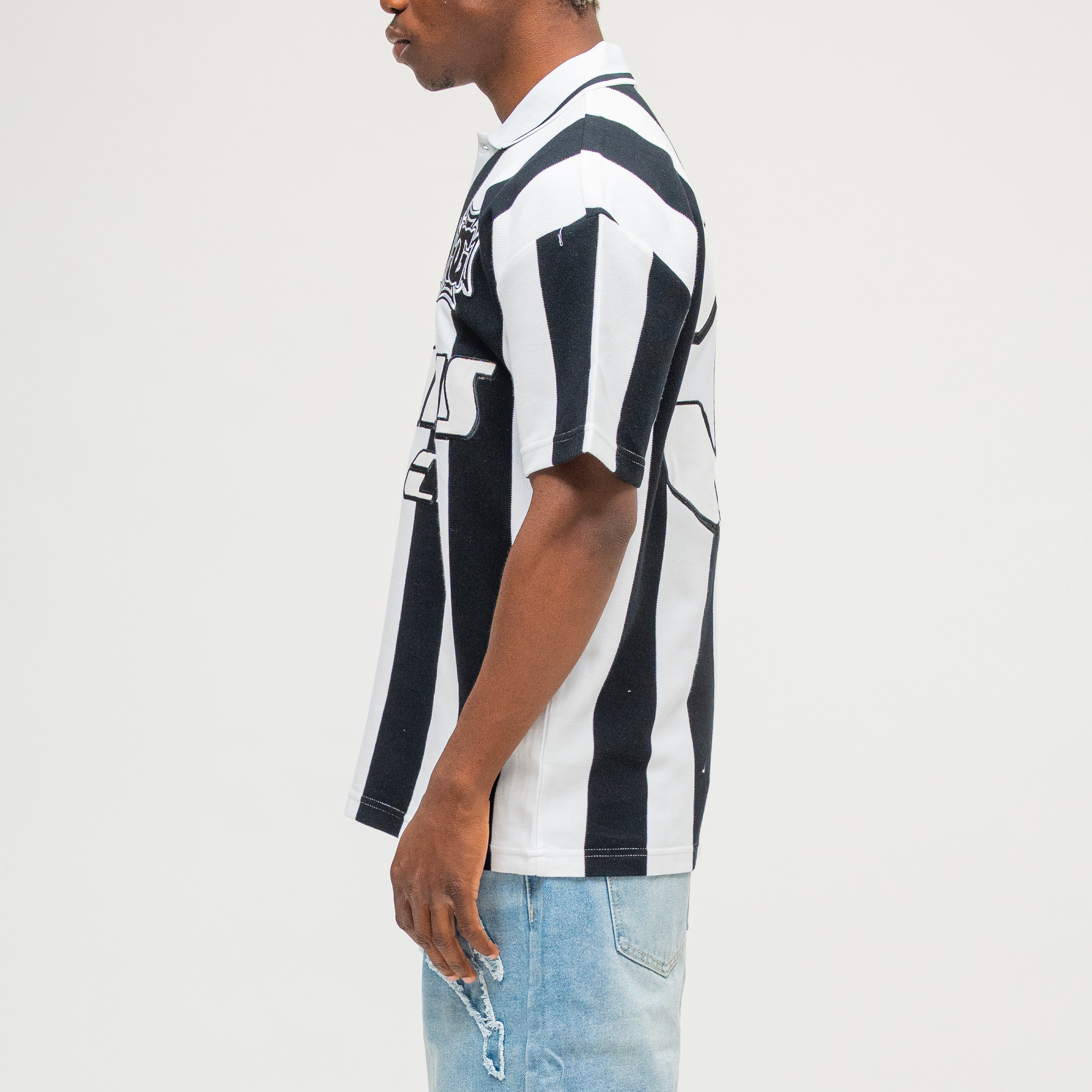 CAMPUS GOODS LA Striped SS Polo in Black, side view